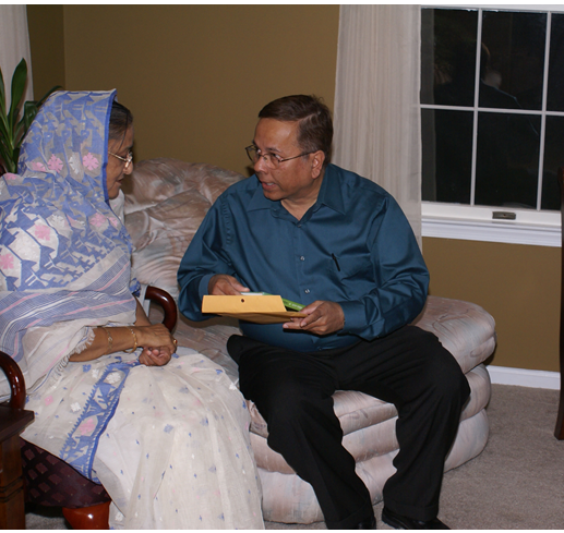 Jamal Hasan presents the book to the Honorable Sheikh Hasina